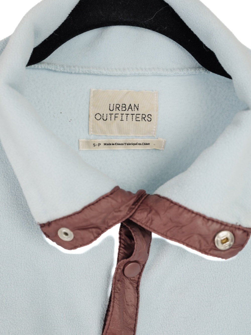 Urban Outfitters pullover fleece top in light blue with brown accents. SP